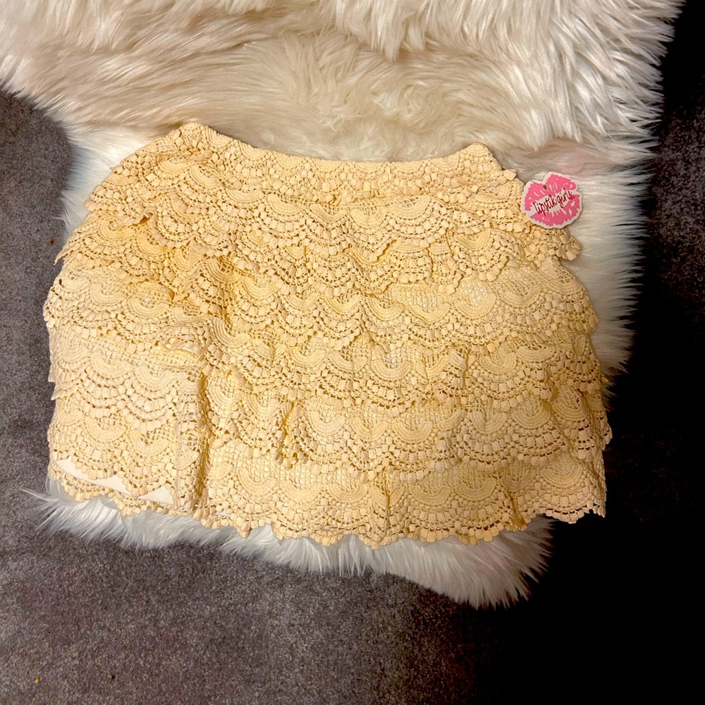 Super cute lace like skirt. Amazing with boots.
